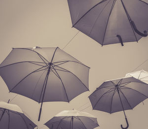 Low angle view of umbrella against sky