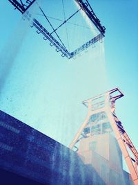 Low angle view of built structure against blue sky