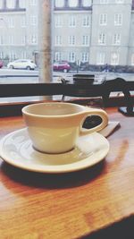 Close-up of coffee served on table in cafe