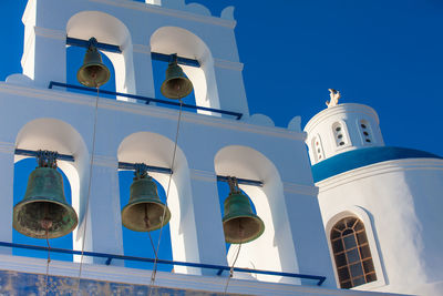 Dome and bell tower of the church of panagia platsani located in oia city at santorini island