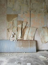 Damaged wall in abandoned building