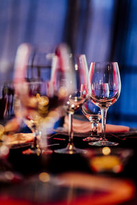 Luxury table settings for fine dining with and glassware, beautiful blurred background. 