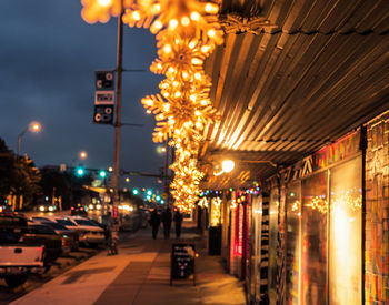 Illuminated street lights at night