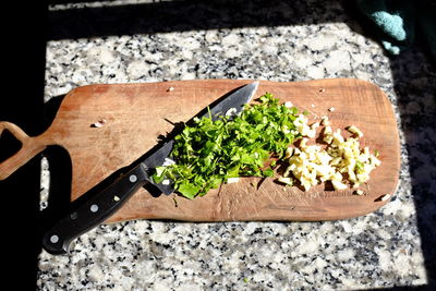 High angle view of chopped vegetables on cutting board