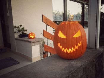 View of pumpkins and orange lanterns