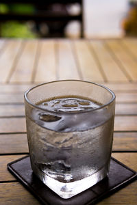 Close-up of beer glass on table