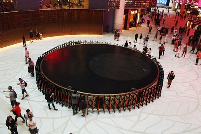 High angle view of people playing piano