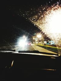 Cars on road at night