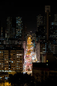 Illuminated buildings in city at night