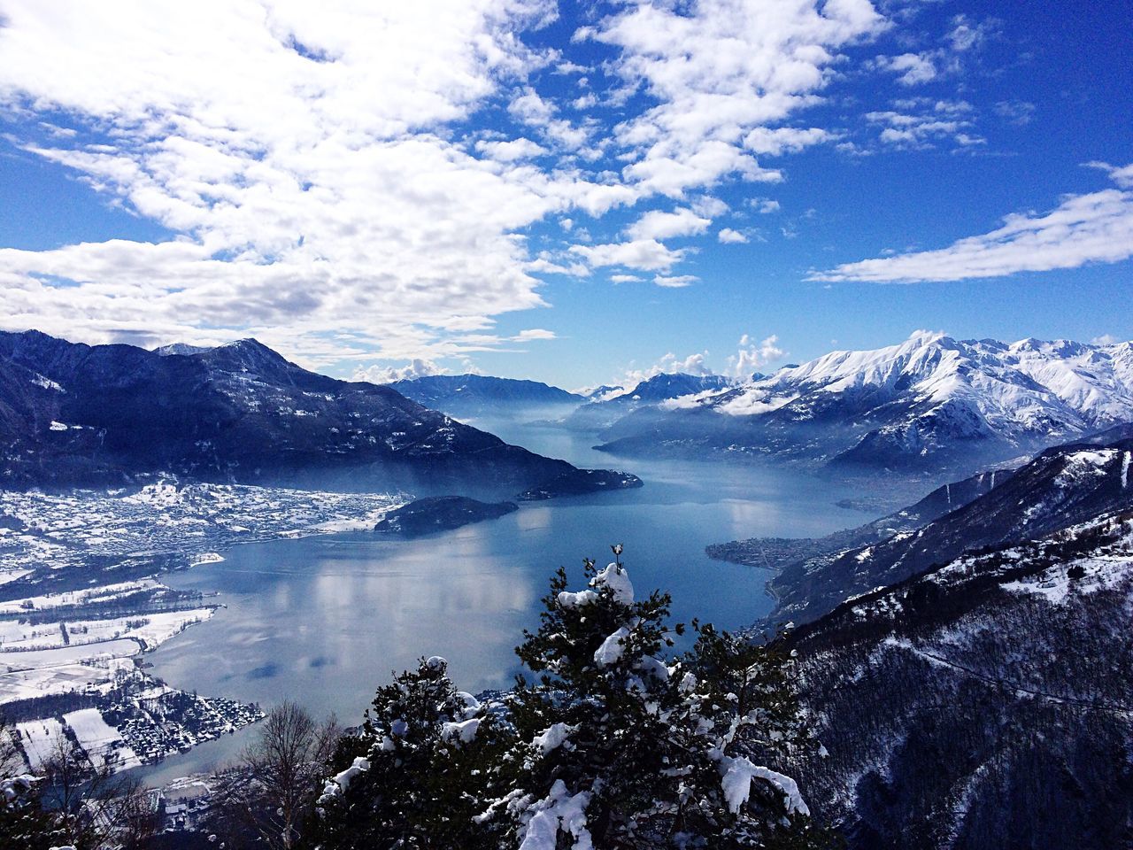 mountain, mountain range, snow, winter, tranquil scene, scenics, cold temperature, tranquility, beauty in nature, sky, snowcapped mountain, season, nature, cloud - sky, landscape, lake, weather, non-urban scene, idyllic, cloud