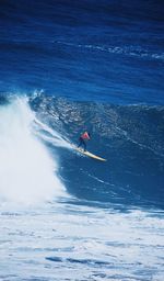 Man surfing in sea