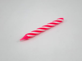 High angle view of fork over white background