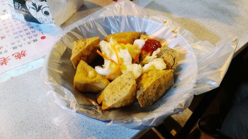 High angle view of bread on paper