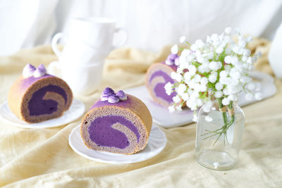 Close-up of cake served on table