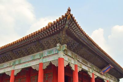 Low angle view of temple building against sky