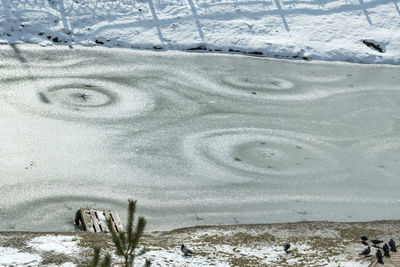 High angle view of snow covered land