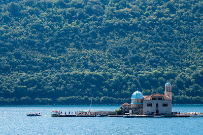 Small island with monastery on it in the sea