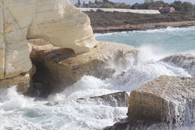 Scenic view of rocks in sea