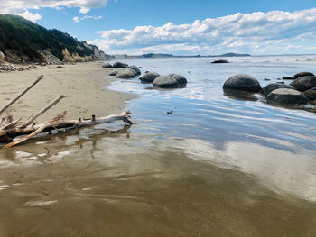 Scenic view of beach against sky