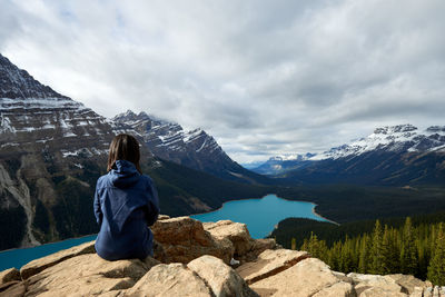 Girl enjoying the view on a hike at peyto lake, banff national park