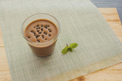 Chocolate banana smoothie topping sprinkled with chocolate chips