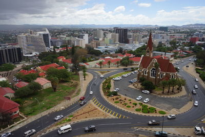 High angle view of street amidst buildings in city