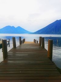 Pier over sea against sky