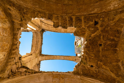 Old ruin building against clear sky