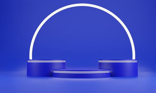 Close-up of illuminated lamp against blue background