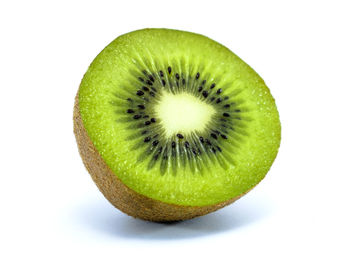 Close-up of lemon slice against white background