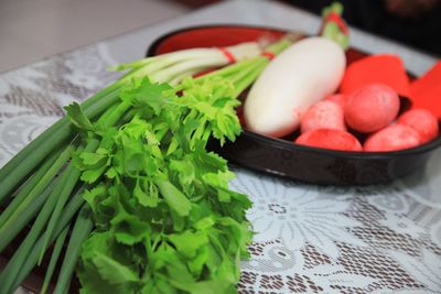 High angle view of chopped fruits in bowl on table