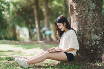 Young woman using mobile phone