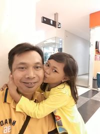 Portrait of happy mother and daughter