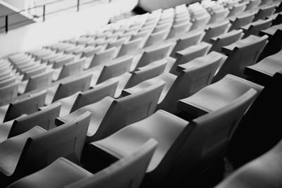 High angle view of empty chairs in stadium