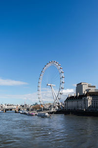 View of the london eye and the thames river