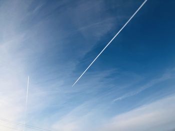 Low angle view of vapor trail in sky