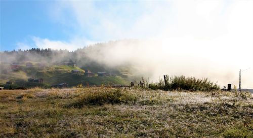 Scenic view of land against sky