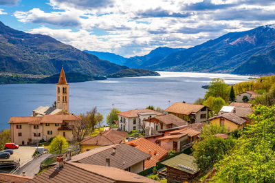 High angle view of townscape and mountains against sky