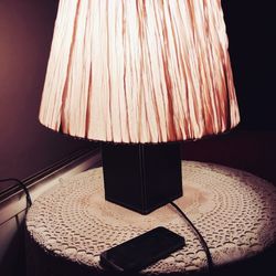 High angle view of illuminated lamp on table