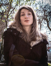 Portrait of young woman in winter