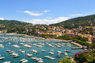 Old fishing village on the shore of the gulf of the poets with anchored boats in the harbor