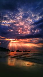 Scenic view of sea against dramatic sky