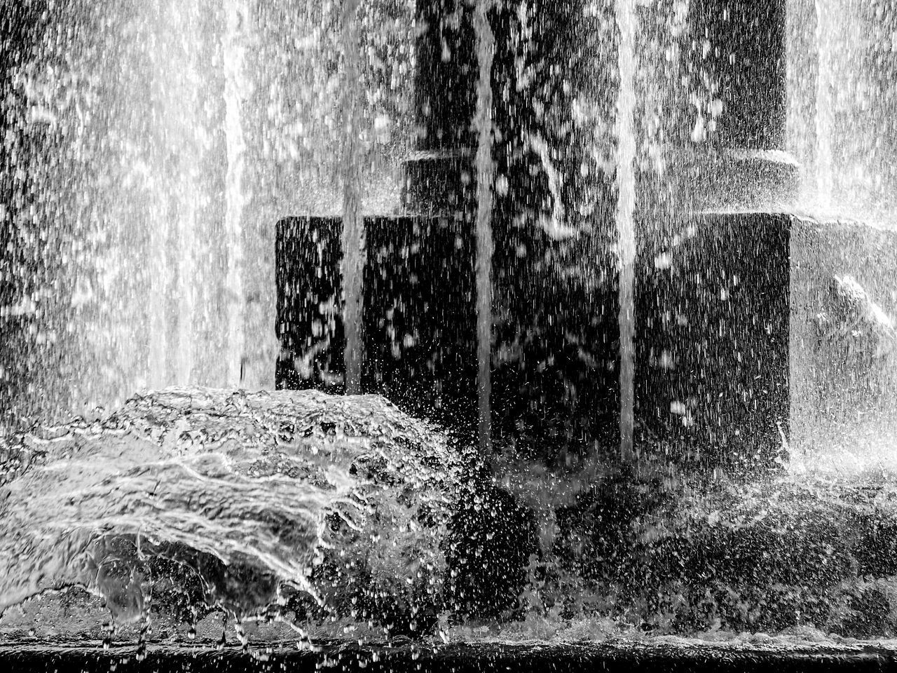 WATER SPLASHING THROUGH FOUNTAIN