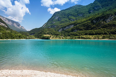 Scenic view of sea and mountains against sky lake tenno italy