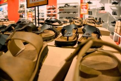 Close-up of women's shoes for sale in a shopping mall 