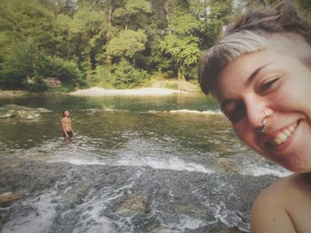 Close-up of shirtless boy in water