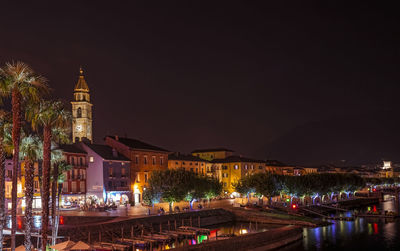 Illuminated buildings in city at night