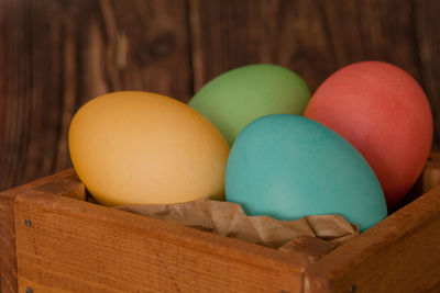 Close-up of multi colored eggs on table