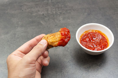 Close-up of hand holding food