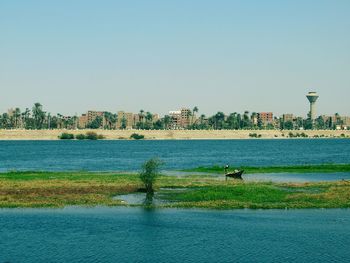 Scenic view of river against clear sky